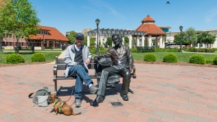 Terry and President Lincoln chatting on a park bench