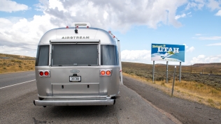 Stopping to admire the Utah state sign