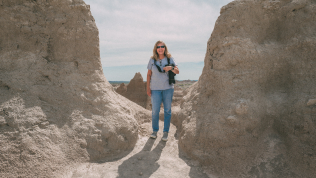 Janet hiking at Badlands National Park